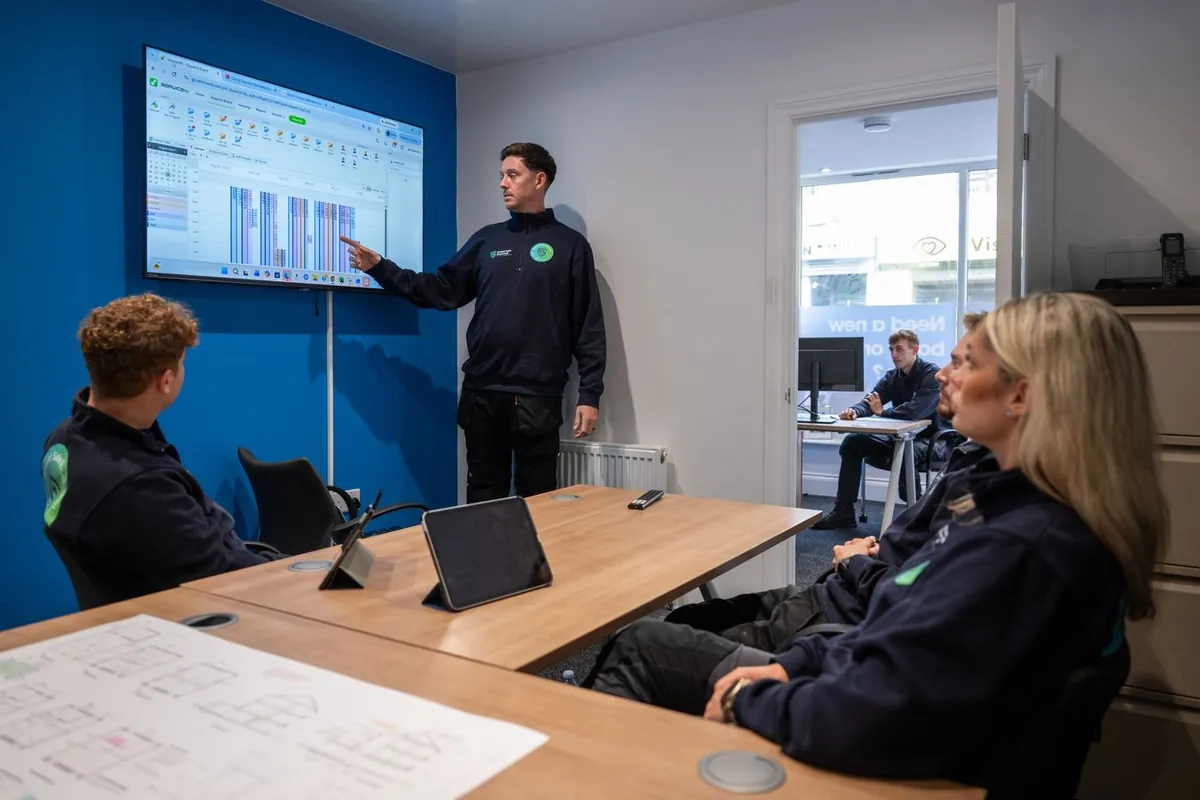 Shield Safe Electrical team training session in the office