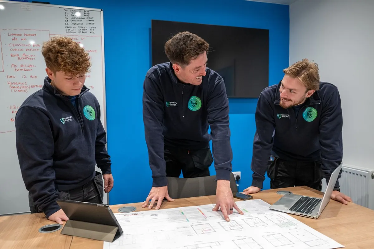 The Shield Safe Electrical team planning the electrics for a renovation from drawings